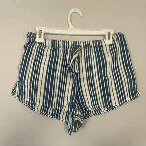 Ripcurl blue and white striped shorts with a tie. Size Medium